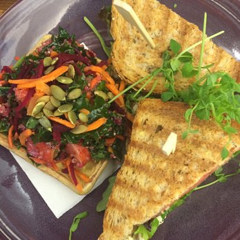 Sol Kitchen - a purple plate with a sandwich and salad - American Near Me - Collingwood, Ontario