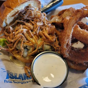 Islands Restaurant - Kilauea burger with onion rings. - Burgers Near Me - Avondale, Arizona Islands Restaurant - Kilauea burger with onion rings. - Burgers Near Me - Avondale, Arizona