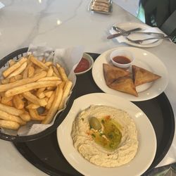 Fries, samosa, hummus and bread