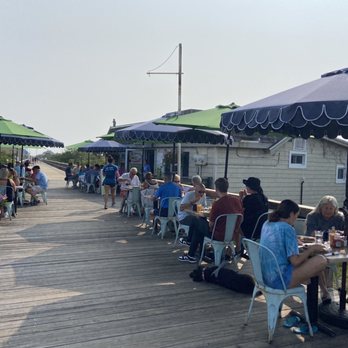 Fishin' Pier Grille - eople sitting under umbrellas - Breakfast & Brunch Near Me - Avalon, New Jersey