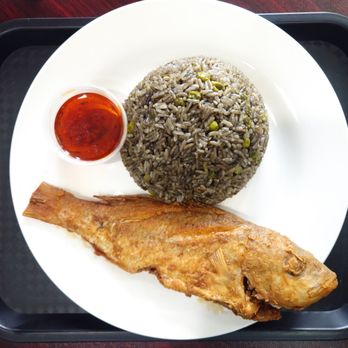 Zoe’s Haitian Restaurant - Stew Fish with Black Rice - Haitian Near Me - Rochester, New York Zoe’s Haitian Restaurant - Stew Fish with Black Rice - Haitian Near Me - Rochester, New York