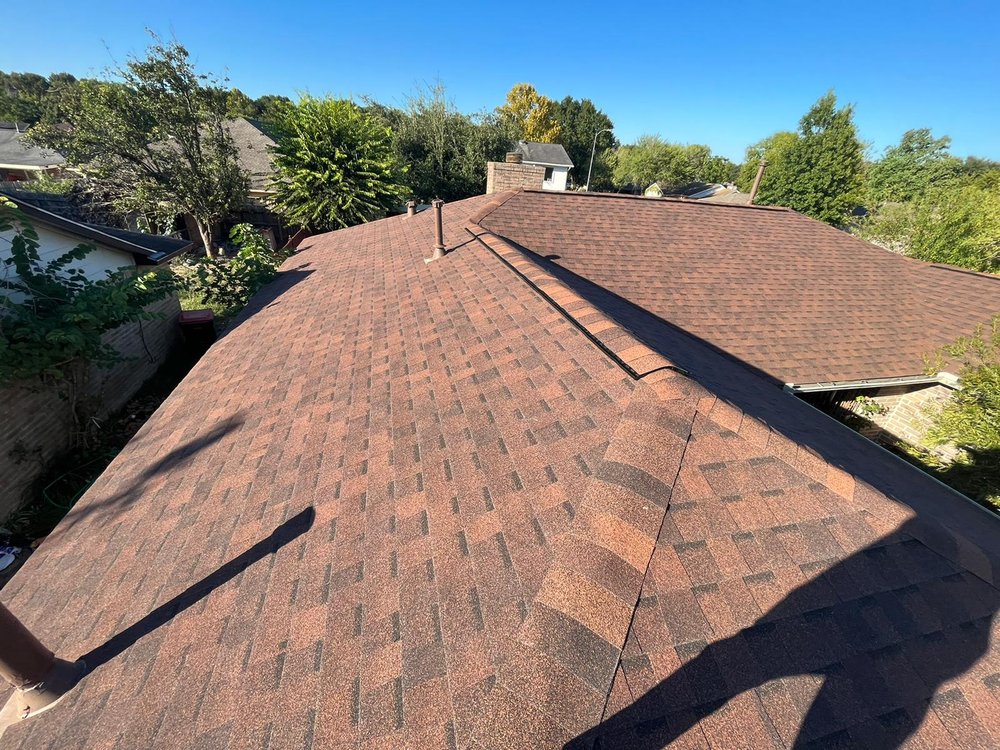 Slide of JUST ROOFING AND REMODELING
