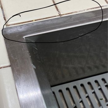 Fitzgerald Plumbing - Permanent scratching etched by tech using steel pad to remove dried caulking after install. - Plumbing Near Me - Cerritos, California Fitzgerald Plumbing - Permanent scratching etched by tech using steel pad to remove dried caulking after install. - Plumbing Near Me - Cerritos, California