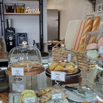 Le Paris Brest Cafe - Items on top of display case on right side of counter - Patisserie/Cake Shop Near Me - Henderson, Nevada