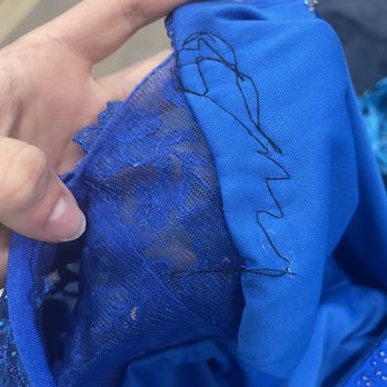 Trendz - This is the top of the dress which was supposed to be tightened to fit better and it did not bf it properly. - Bridal Near Me - Freehold Township, New Jersey
