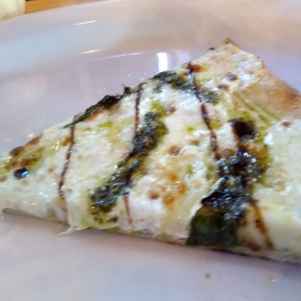 Fired Up Pizza - Finished with EVOO, Pesto Sauce and Balsamic Glaze. PERFECT! - Pizza Near Me - Jacksonville, Florida Fired Up Pizza - Finished with EVOO, Pesto Sauce and Balsamic Glaze. PERFECT! - Pizza Near Me - Jacksonville, Florida
