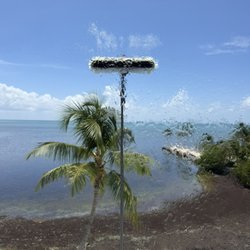 CS Pressure Clean & Seal - A beautiful view of Alligator Lighthouse doesn't hurt while window cleaning!