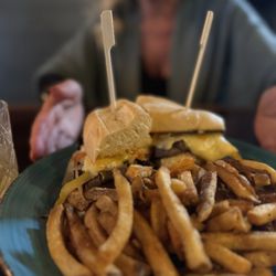 Fume RestoBar - The ribeye sandwich with the most delicious toppings with cheese and onions and the softest bread of all it melts in your mouth,