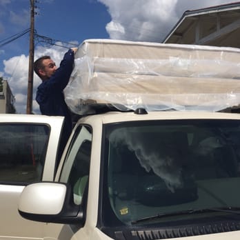 Mattress Warehouse - Peter tying our bed set down. - Furniture Stores Near Me - Fayetteville, North Carolina Mattress Warehouse - Peter tying our bed set down. - Furniture Stores Near Me - Fayetteville, North Carolina