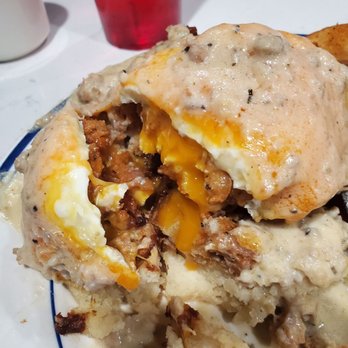 Big Bear Biscuits - Douglas fried egg over crispy chicken, cut in half to show yummy goodness within - Breakfast & Brunch Near Me - Indianapolis, Indiana