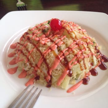 Sushi Pirate - Kani salad. Oddly topped with a cherry. - Japanese Near Me - North Aurora, Illinois Sushi Pirate - Kani salad. Oddly topped with a cherry. - Japanese Near Me - North Aurora, Illinois