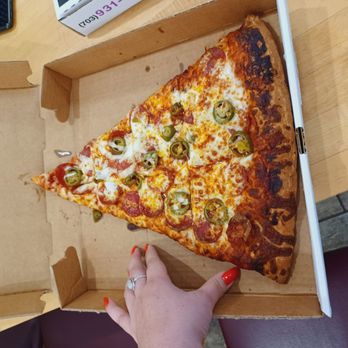 Duccini's Pizza - Slice is Bigger than the box - Pizza Near Me - Falls Church, Virginia