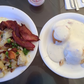 The Red Caboose Cafe - Eggs over easy with potatoes/bell pepper, bacon, sausage and biscuits and gravy. - Cafes Near Me - Clovis, California The Red Caboose Cafe - Eggs over easy with potatoes/bell pepper, bacon, sausage and biscuits and gravy. - Cafes Near Me - Clovis, California