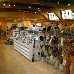 Goddess Isis Books & Gifts - Here you can see our music section and a bit of the statuary we carry.