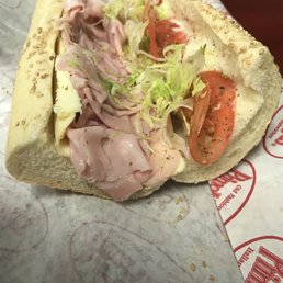 a sub sandwich on a wrapper