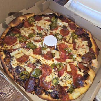Burattino Brick Oven Pizza - Pepperoni, pineapple, japalapeños, and black garlic sauce. - Pizza Near Me - Carson, California Burattino Brick Oven Pizza - Pepperoni, pineapple, japalapeños, and black garlic sauce. - Pizza Near Me - Carson, California