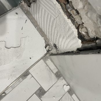 Power Home Builders - gaps behind removed tile makes me question the rest of the tile work - General Contractors Near Me Power Home Builders - gaps behind removed tile makes me question the rest of the tile work - General Contractors Near Me