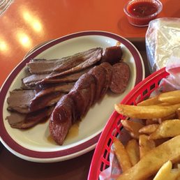 a plate of steak and french fries a plate of steak and french fries