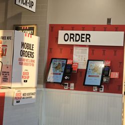 KFC - Order kiosks and mobile pick-up (which isn't being used)