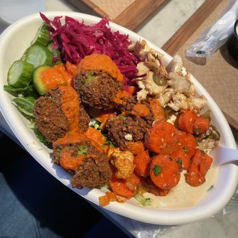 Brassica - Vegan salad bowl with rice and lentils, greens, carrots, cauliflower, pickled cabbage, cukes and radishes, hummus, falafel, red pepper sauce - Mediterranean Near Me - Columbus, Ohio