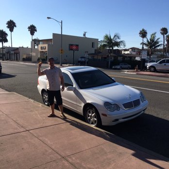 Ocean Auto Sales - Alec just moved to sunny California, upon arrival he bought this 2002 C-Class Mercedes with under 70,000 miles! - Car Dealers Near Me - San Clemente, California