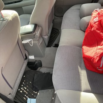 Chilli Cheese Auto Detailing - Before: popcorn and other dirtiness on the ground and floor mats - Auto Detailing Near Me Chilli Cheese Auto Detailing - Before: popcorn and other dirtiness on the ground and floor mats - Auto Detailing Near Me