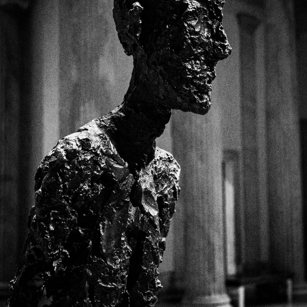 Buffalo AKG Art Museum - Alberto Giacometti; Man Walking (Version 1); 1960; bronze - Art Galleries Near Me - Buffalo, New York