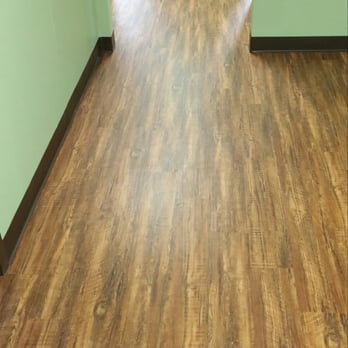 Deca Floors - a wood floor in a hallway - Flooring Near Me Deca Floors - a wood floor in a hallway - Flooring Near Me