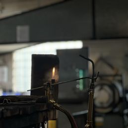 This is inside the demonstration where they do the glass work heating up some type of object This is inside the demonstration where they do the glass work heating up some type of object