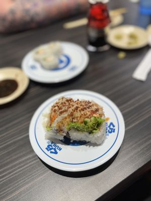 Kura Revolving Sushi Bar by null