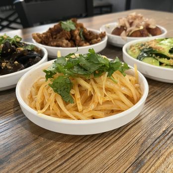Jibei Chuan - four bowls of food on a table - Chinese Near Me - Boston, Massachusetts Jibei Chuan - four bowls of food on a table - Chinese Near Me - Boston, Massachusetts