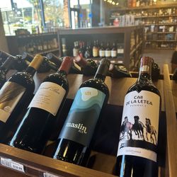 Tilted Bottles Wine, Beer & More
