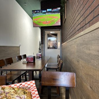 Curry Pizza House Sacramento - a baseball game on tv - Chicken Wings Near Me - Sacramento, California