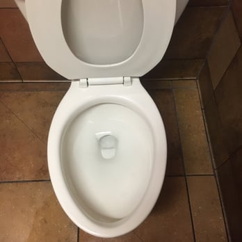 Taco Bell - This honestly is a photo in the men's room of the Taco Bell. It definitely is an essential part of the average consumer experience. - Fast Food Near Me - Memphis, Tennessee