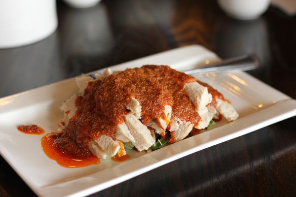 Photo of China Village - Albany, CA, US. Szechuan boneless chicken with julienned onion (棒棒鸡) ($6.95) - sauce is good but chicken is awful: tough and dry.