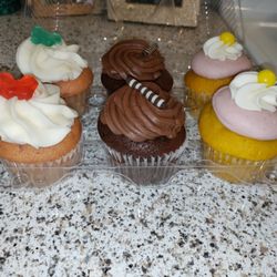 Cornerstone Bakery - Strawberry, chocolate and lemon filled with a raspberry filling and with raspberry frosting.