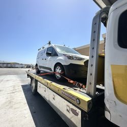 Quezada Towing - Company vehicle being towed