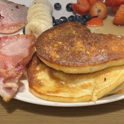 Lizzy’s Little Kitchen - Gluten free pancakes. If it wasn't made clear on the menu, one would not know they are gluten free. Side of bacon.