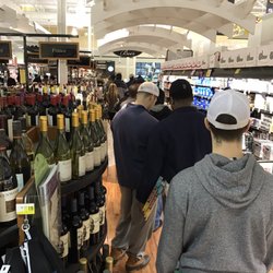 Harris Teeter - Yes the line to checkout is down past the beer and wine aisle