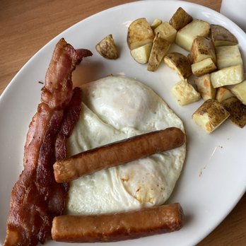 Sunset Grill - 3 eggs, 2 bacon, 2 sausage with home fries and toast. - Breakfast & Brunch Near Me - Stouffville, Ontario Sunset Grill - 3 eggs, 2 bacon, 2 sausage with home fries and toast. - Breakfast & Brunch Near Me - Stouffville, Ontario