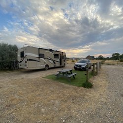 Platte River RV & Campground - RV spot, fake grass makes for a clean spot.