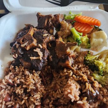 Daisy's Authentic Jamaican Restaurant - Oxtail with dried red beans and rice and broccoli and cauliflower! - Caribbean Near Me - Cypress, Texas