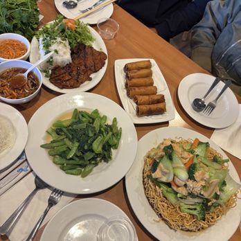 Phuong Trang - Char grilled Beef, Vegetarian Egg Rolls, Chinese Broccoli in oyster sauce, and Chicken stir fried noodles - Vietnamese Near Me - San Diego, California Phuong Trang - Char grilled Beef, Vegetarian Egg Rolls, Chinese Broccoli in oyster sauce, and Chicken stir fried noodles - Vietnamese Near Me - San Diego, California