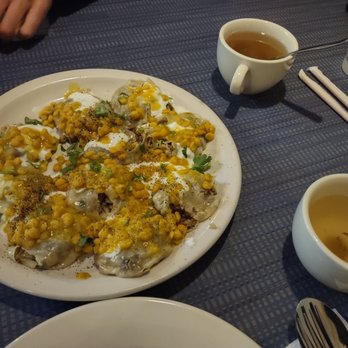 The Afghan Village - Mantu dish Dumplings topped with lentils and yogurt chutney - Middle Eastern Near Me - Houston, Texas The Afghan Village - Mantu dish Dumplings topped with lentils and yogurt chutney - Middle Eastern Near Me - Houston, Texas