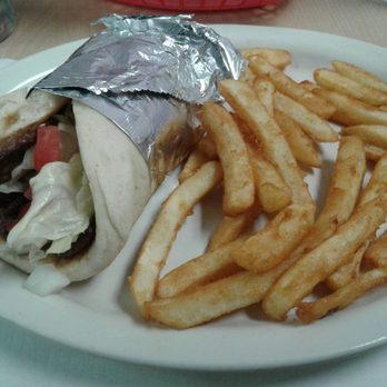 Purple Sage Cafe - a plate of fries and a pita sandwich - Cafes Near Me - Dunnellon, Florida Purple Sage Cafe - a plate of fries and a pita sandwich - Cafes Near Me - Dunnellon, Florida