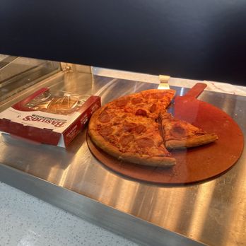 Mobil - a pizza with a slice missing - Gas Stations Near Me - BOYNTON BEACH, Florida