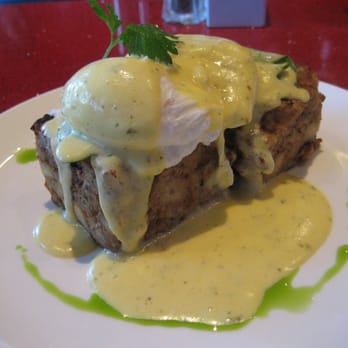 Nicks On Broadway - Pudd'n & Eggs - Sausage and Buttermilk Biscuit Bread Pudding Topped with Poached Eggs and Hollandaise Sauce - New American Near Me - Providence, Rhode Island Nicks On Broadway - Pudd'n & Eggs - Sausage and Buttermilk Biscuit Bread Pudding Topped with Poached Eggs and Hollandaise Sauce - New American Near Me - Providence, Rhode Island