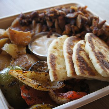 Paros Real Greek - Closeup of pita bread - Greek Near Me - Calgary, Alberta Paros Real Greek - Closeup of pita bread - Greek Near Me - Calgary, Alberta