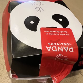 Panda Express - a box with a panda face on it - Chinese Near Me - San Juan, Puerto Rico