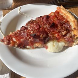 Slice of meat and more meat deep dish.